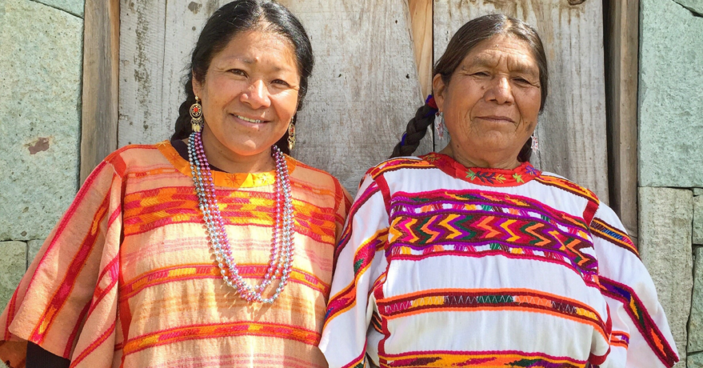 Two mexican ladies smiling 